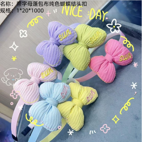Solid - color bow - shaped hair buckle with letter - printed puffy fabric cover