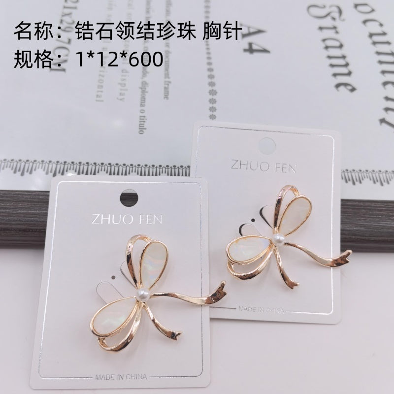 Zircon bow - tie pearl brooch