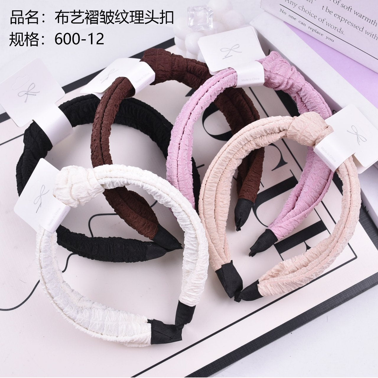 Fabric pleated texture head buckle