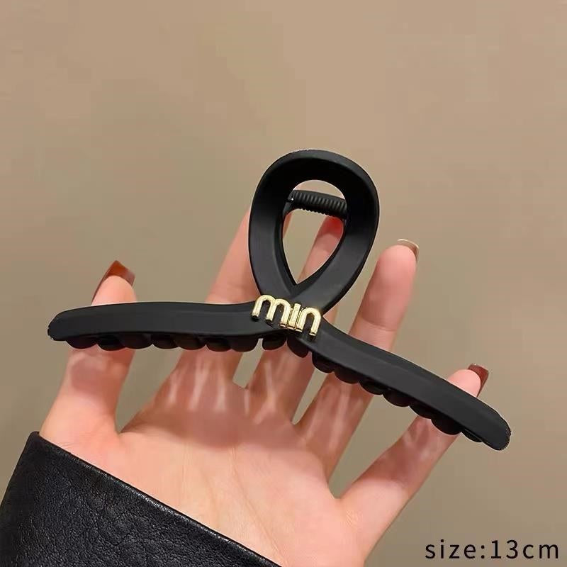 cross letter head claw black