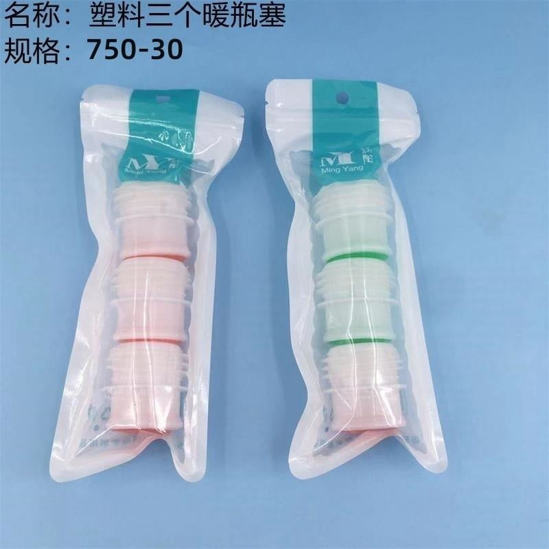 Three plastic thermos bottle stoppers