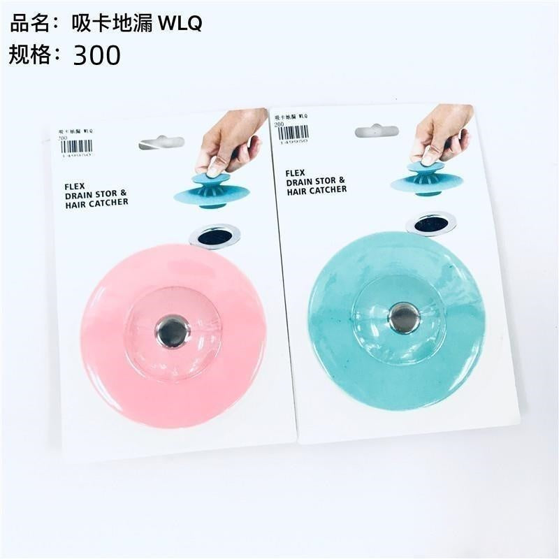Suction card floor drain