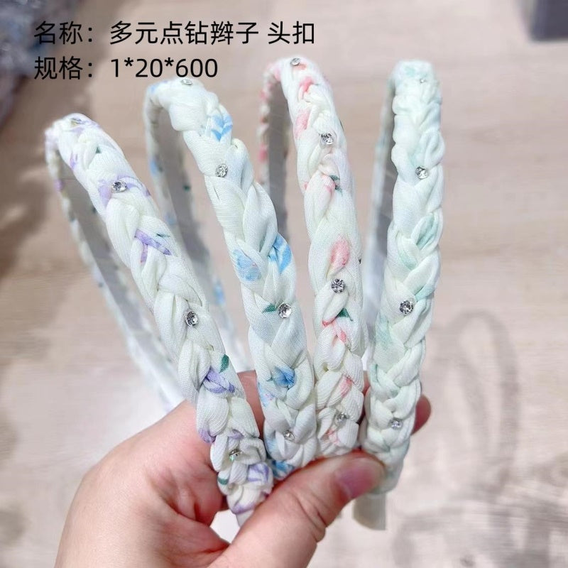 Multivariate rhinestone - studded braid head buckle