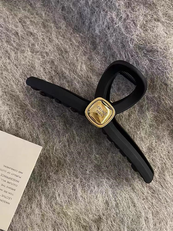 Cross gold head claw black