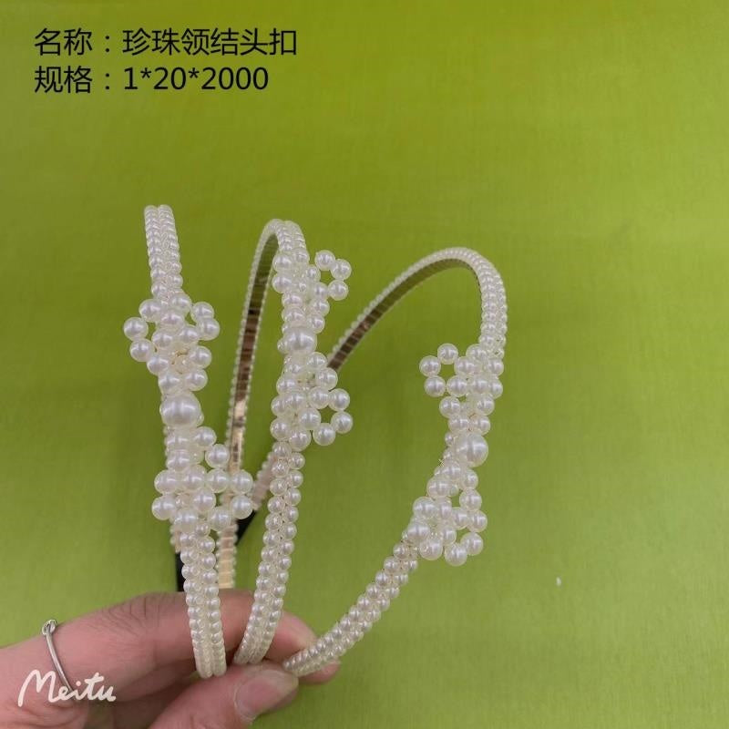 Pearl bow tie buckle