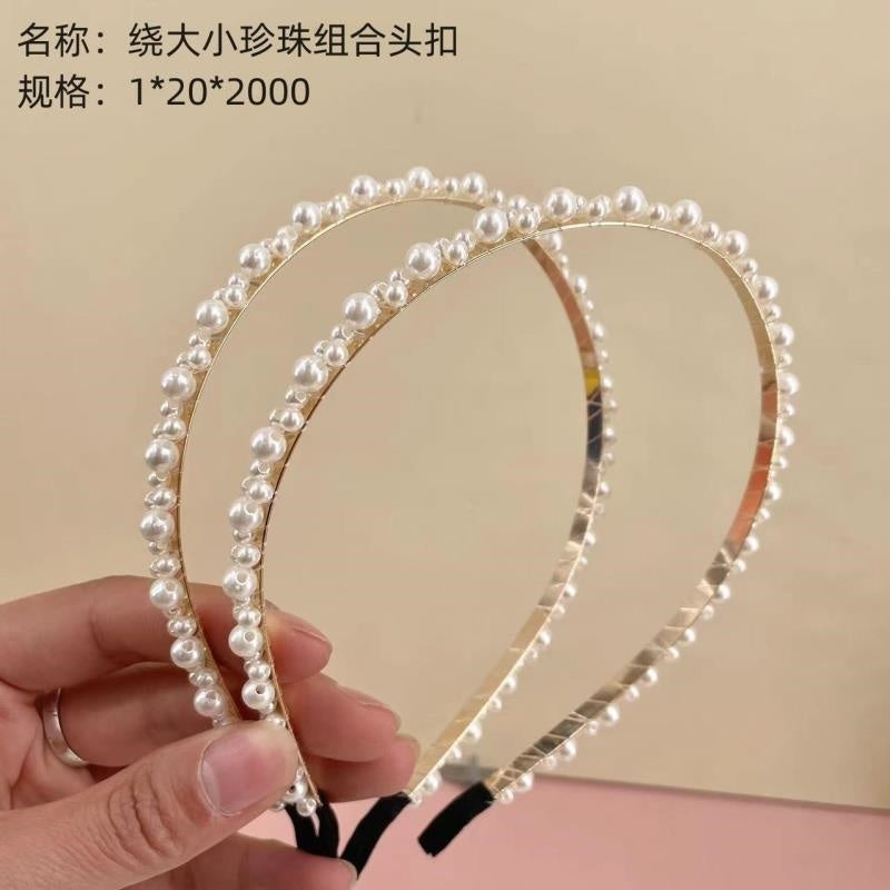 Wrapped large and small pearl combination head buckle