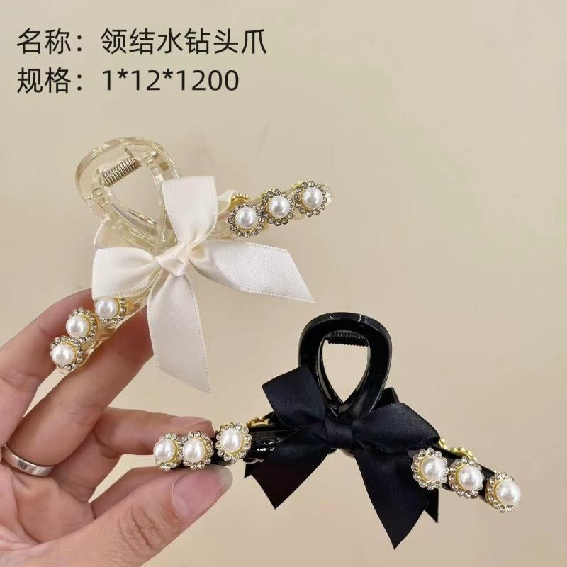 Bow - tie rhinestone head claws