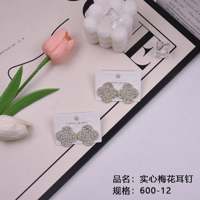 Solid plum blossom stud earrings