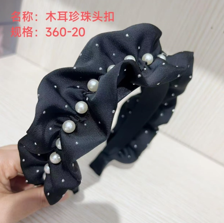 Hebilla con oreja de madera y cabeza de perla