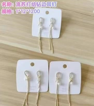 Stream soda knot diamond - edged stud earrings