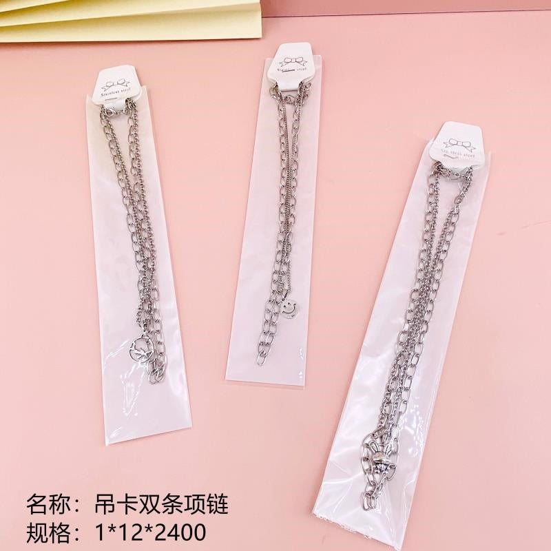 Double - chain necklace with hanging tag