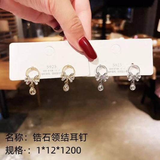 Zircon bow - tie stud earrings