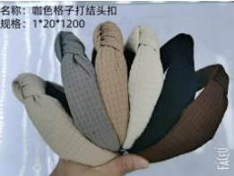 Brown checked knotted head buckle