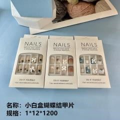 Small white box bow - shaped nail tips