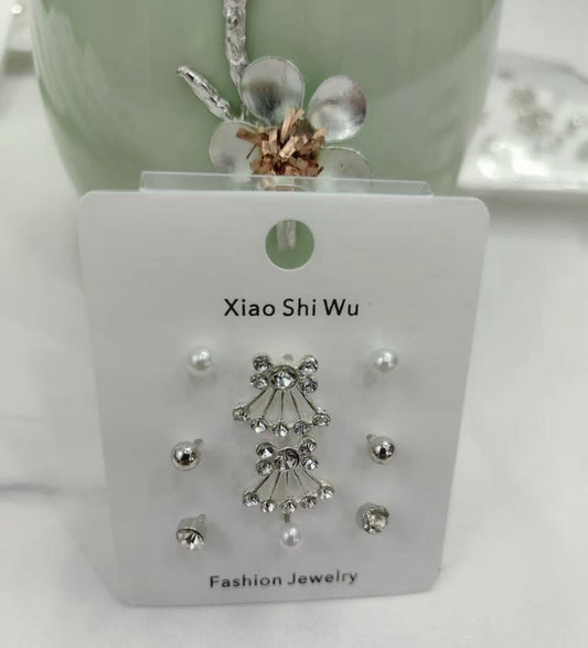 4 and a half pairs of stud earrings