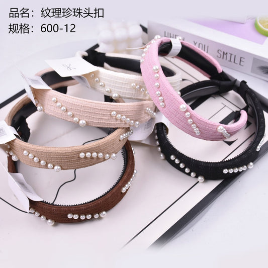 Textured pearl head buckle