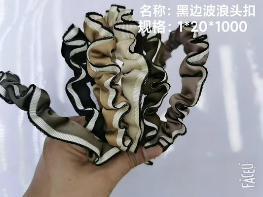 Black - edged wavy head buckle