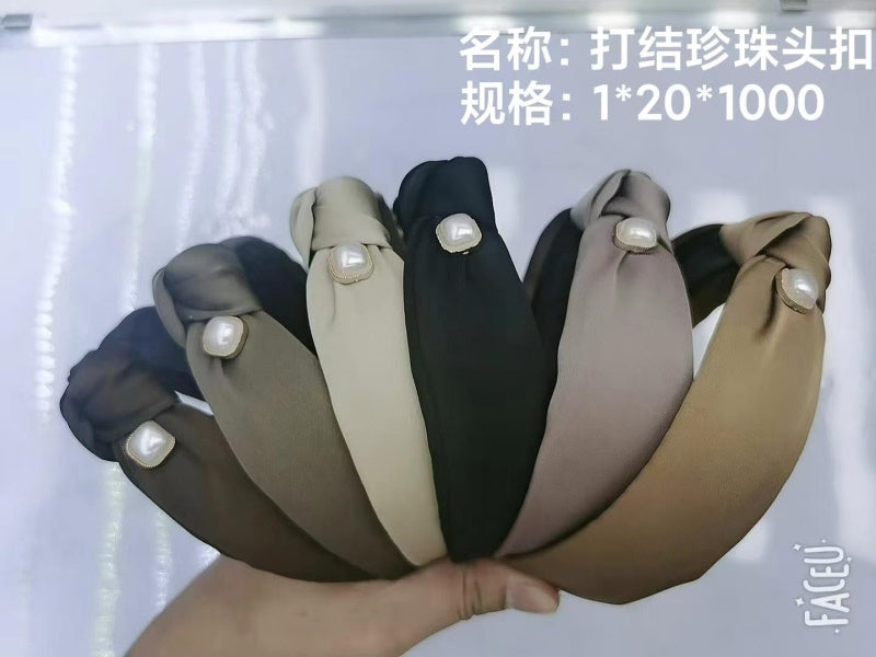 Knotted pearl head buckle