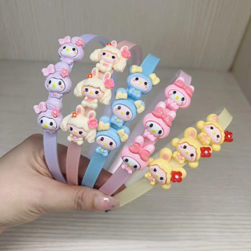 Three cartoon children's head buckles