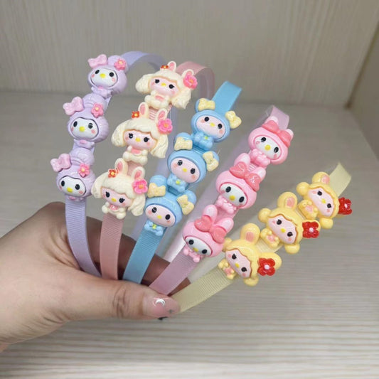 Three cartoon children's head buckles