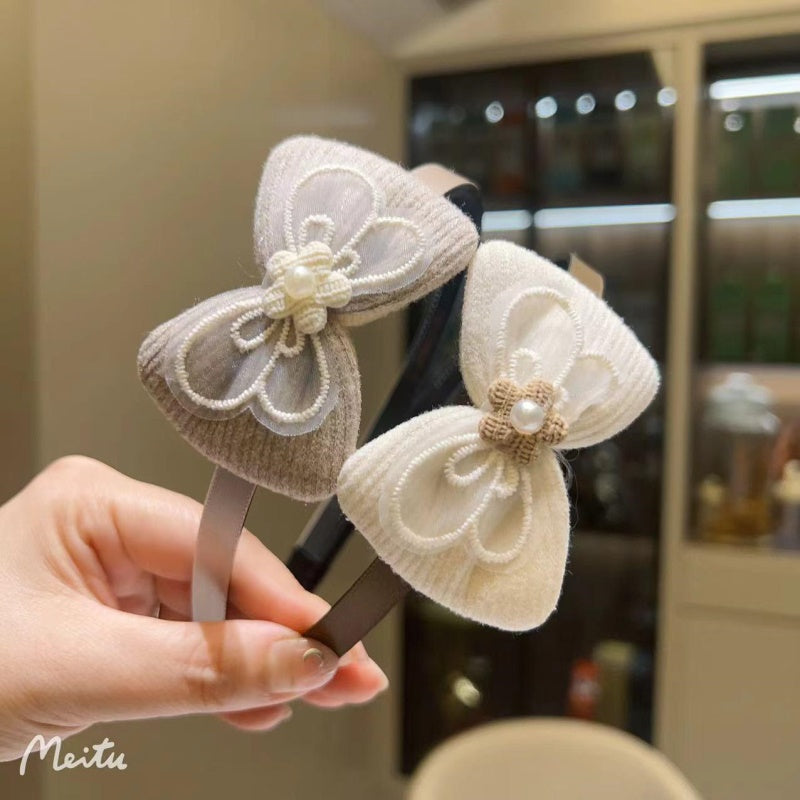 Beige-brown bow tie flower head buckle