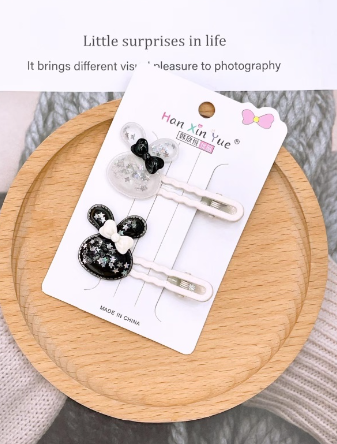 Black and white rabbit head suit clip
