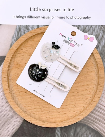Black and white apple suit clip