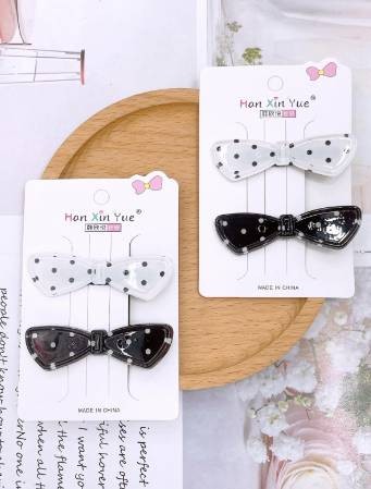 Black and white dot bow tie suit clip