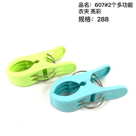 607# 2 multi-functional clothes pegs