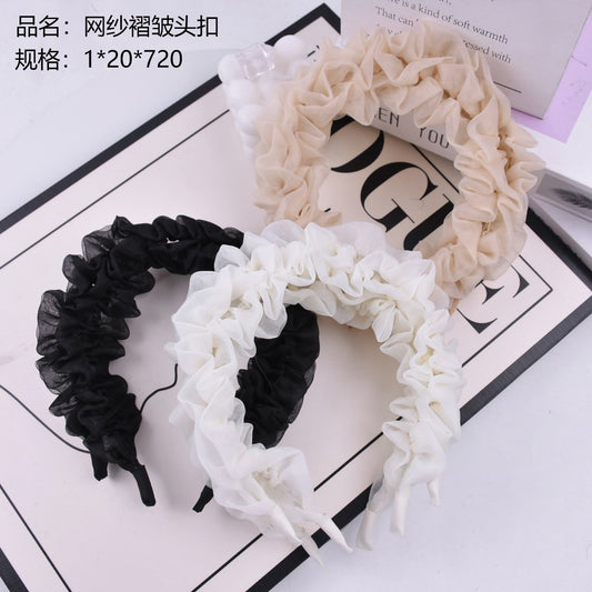 Mesh ruffled head buckle