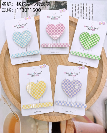 Checked heart - shaped suit clip