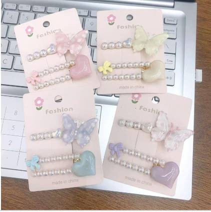 Butterfly and heart - shaped suit clip