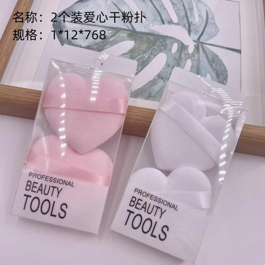 Two-piece pack of heart-shaped powder puffs