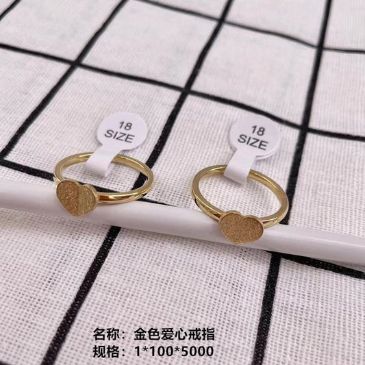a golden heart - shaped ring