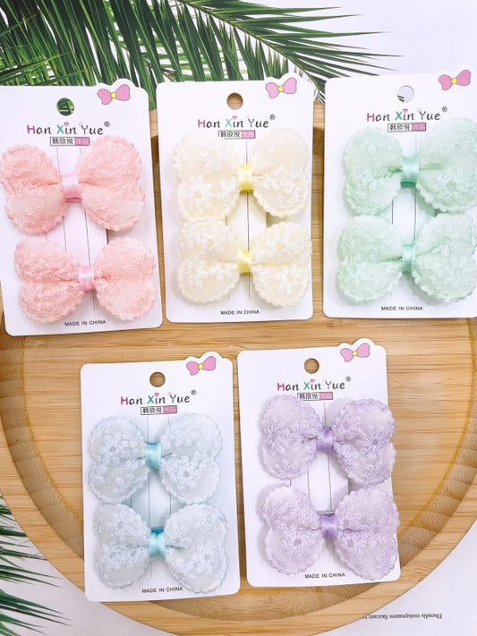 Embroidered bow tie suit clip