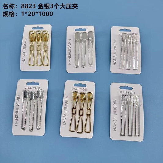 8823 gold and silver, 3 large pressing clips