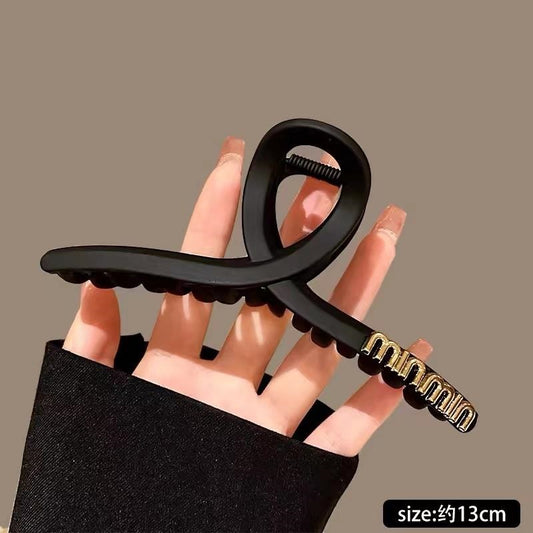 cross double letter head claw black
