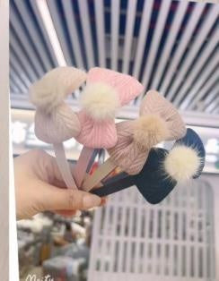 brown fur ball buckle