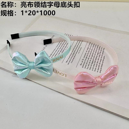 Shiny Cloth Bow-tie Letter Bottom Button