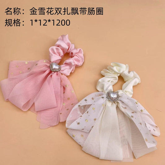 Golden snowflake double tie ribbon intestinal ring