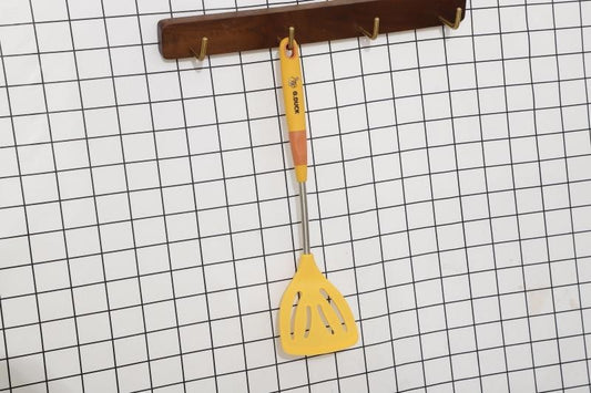 Small and fresh silicone spatula with a little yellow duck design