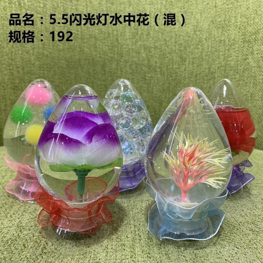 5.5 Flashlight, Flowers in the Water (Mixed)