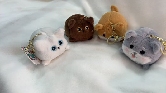 Tail - wagging plush pendant