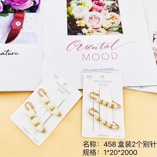 458 boxes, 2 safety pins per box
