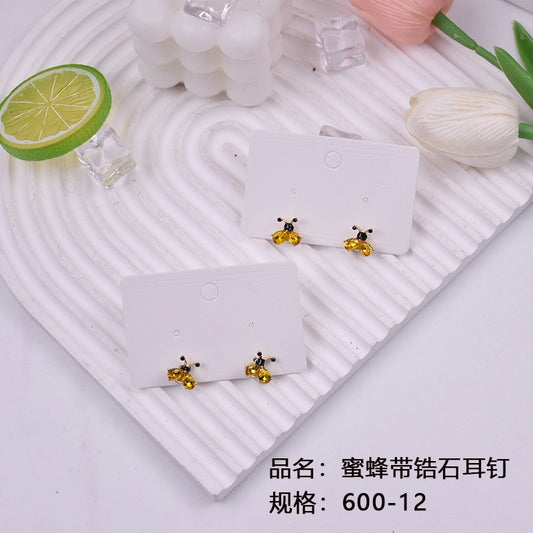 Bees wearing zircon stud earrings