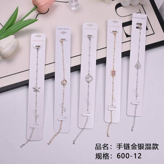 Bracelets with a mix of gold and silver styles