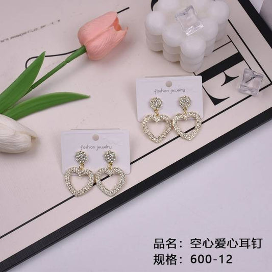 Hollow heart - shaped stud earrings