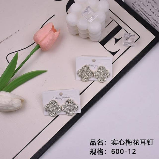 Solid plum blossom stud earrings