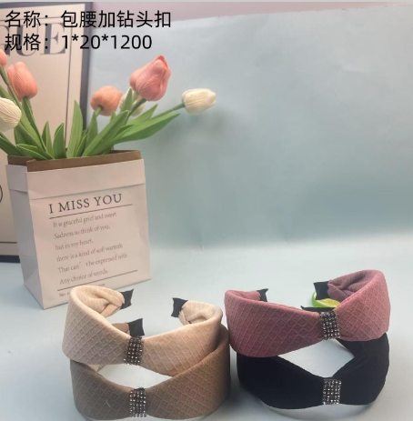 Waist wrap with drill bit buckle