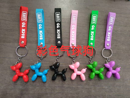Hang colored balloon dogs 